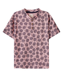  A pink t-shirt with purple leaf prints and buttons