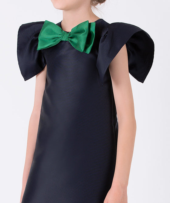 navy party dress with emerald green bow