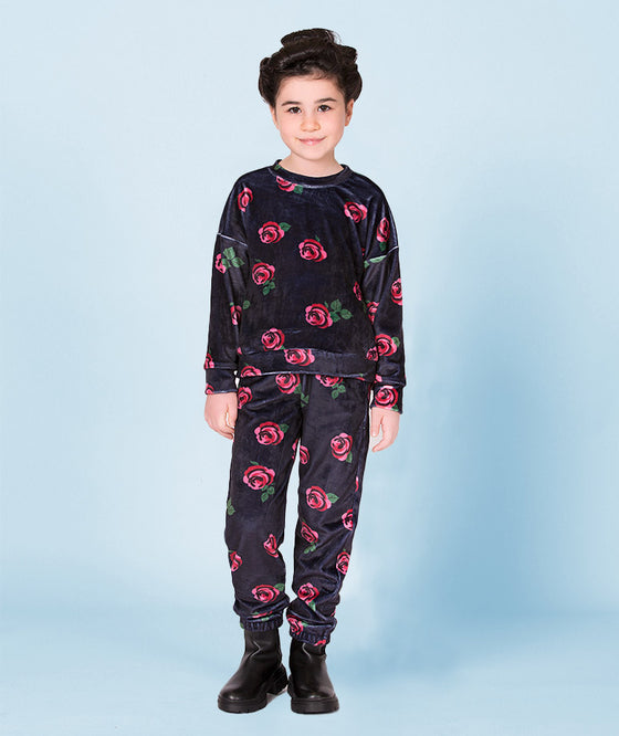 a cozy navy matching set with red rose prints