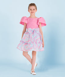  Colorful swirl-patterned girls' skirt with a large bow, perfect for special occasions