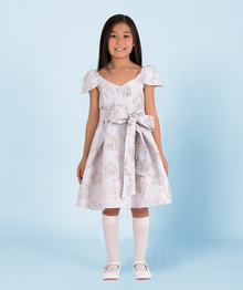  Girls' off-shoulder dress with castle-themed print and a large bow, perfect for special occasions