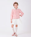 Pink puffy jacket for girls by Mama Luma, with ecru polkas and ecru faux fur collar