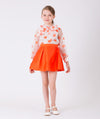 The perfect set of a orange polka dots blouse with a bow and simple elegant pink skirt
