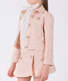 elegant ecru blouse, pink tweed skirt and matching jacket with elegant buttons