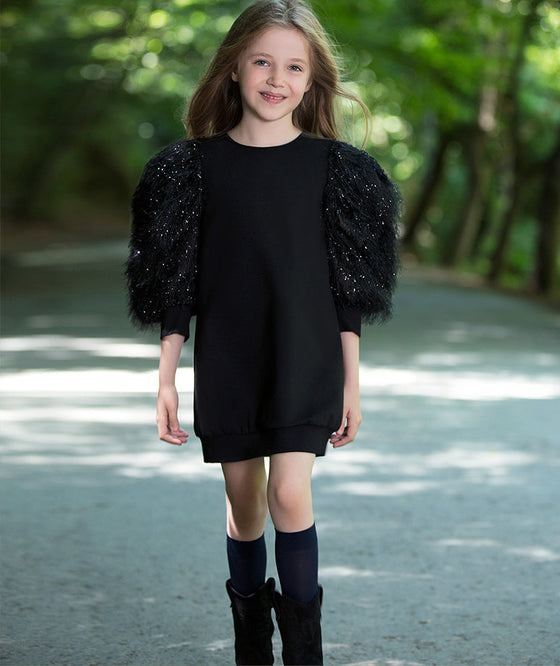 black tassel dress with shimmering feather sleeves for little girls
